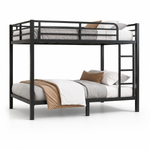 Black full-over-full metal bunk bed with ladder and guardrails in a styled bedroom