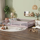 Natural wood Montessori floor bed with fence rails styled in a child's room