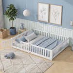 Natural wood Montessori floor bed with fence rails styled in a child's room