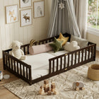 Natural wood Montessori floor bed with fence rails styled in a child's room