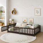 Natural wood Montessori floor bed with fence rails styled in a child's room