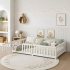 Natural wood Montessori floor bed with fence rails styled in a child's room