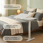 Telescoping height adjustment column on adjustable overbed table, range markers visible