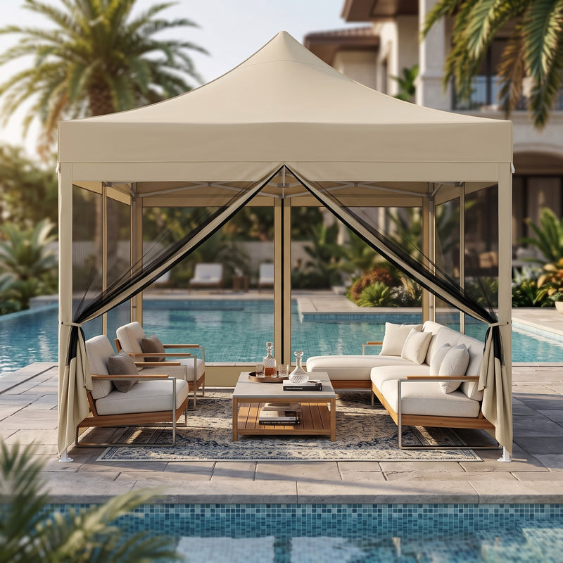 Green pop-up screen gazebo set up beside a pool with an outdoor dining table