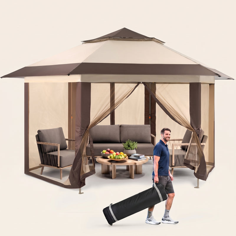 Brown and beige 6-sided pop-up screen tent gazebo set up in a mountain meadow with a table and camping chairs inside