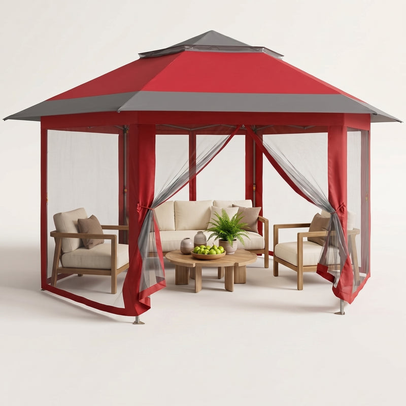 Brown and beige 6-sided pop-up screen tent gazebo set up in a mountain meadow with a table and camping chairs inside