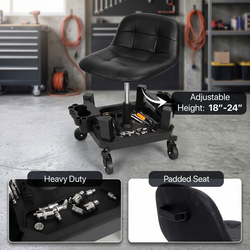 Mechanic seated on a red rolling garage stool adjusting a truck tire with a wrench
