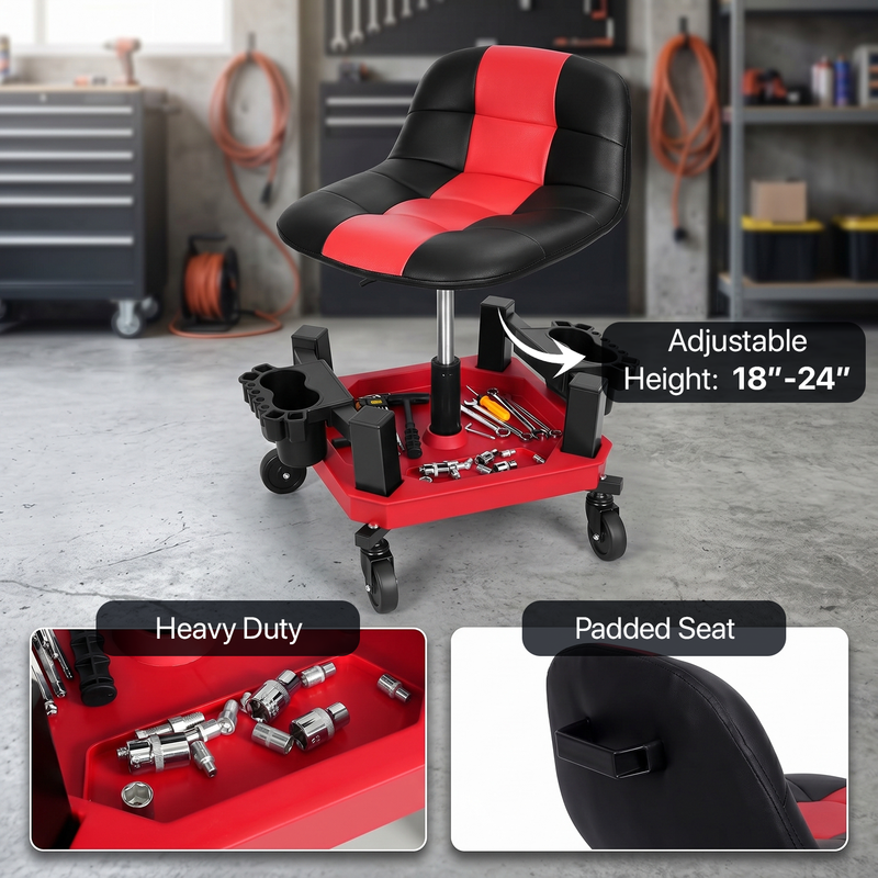 Mechanic seated on a red rolling garage stool adjusting a truck tire with a wrench