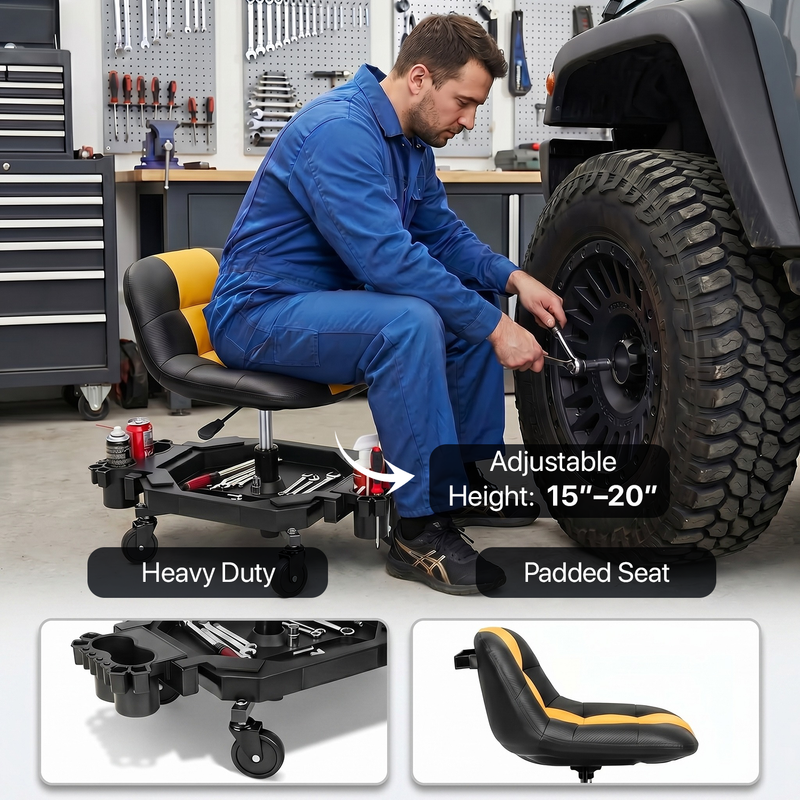 Mechanic seated on a red rolling garage stool adjusting a truck tire with a wrench