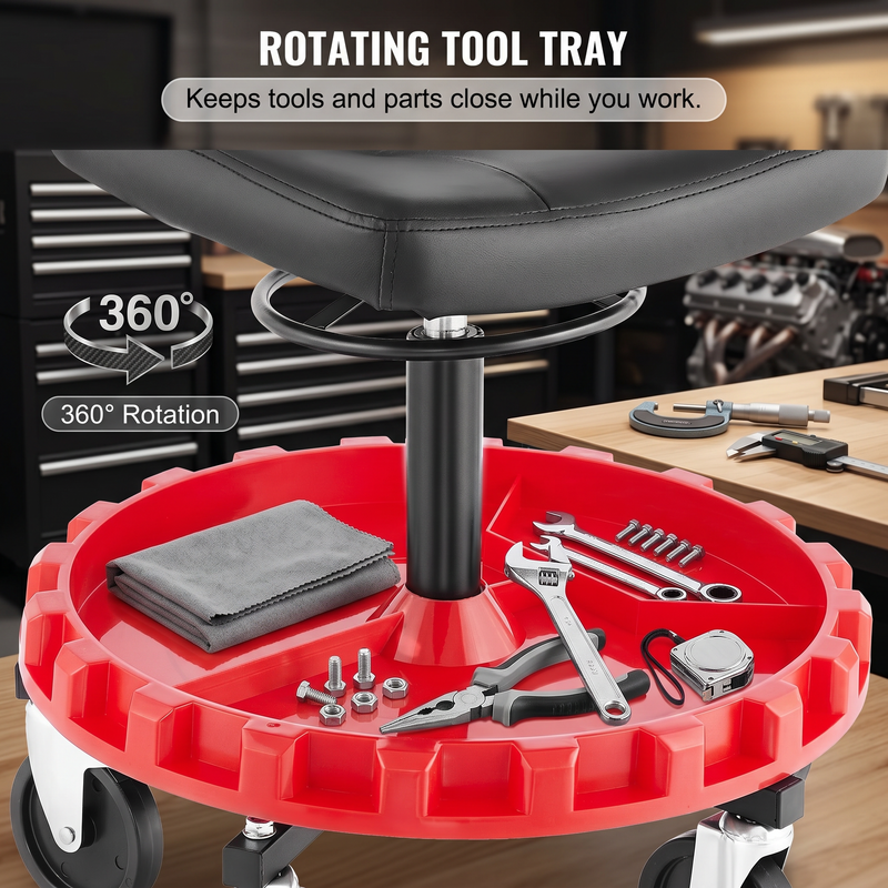 Divided red tool tray on a rolling mechanic stool holding wrenches a screwdriver and a socket set