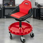 Red and black padded rolling mechanic stool with a divided tool tray and five casters in a garage