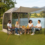 Couple picnicking inside a brown pop-up screen tent by a lake