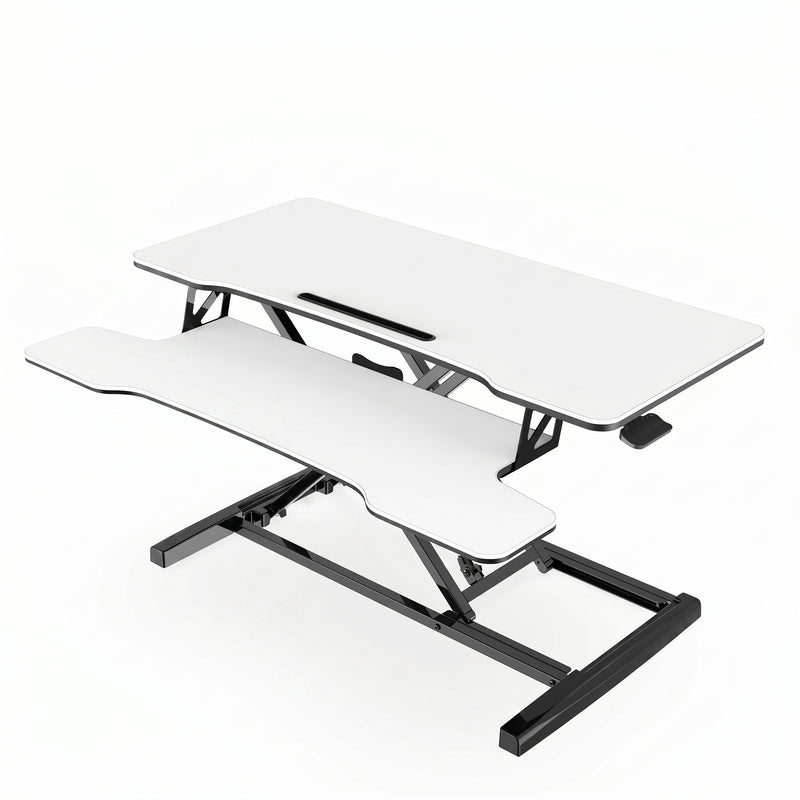 Black standing desk converter shown raised to standing height with keyboard tray extended