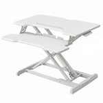 Black standing desk converter shown raised to standing height with keyboard tray extended