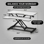 Standing desk converter dimension diagram showing 30 lb desktop capacity and platform measurements