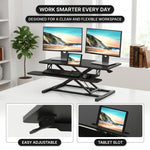 Standing desk converter keyboard tray capacity and pneumatic lift mechanism diagram