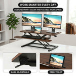 Standing desk converter keyboard tray capacity and pneumatic lift mechanism diagram