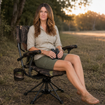 Hunter using camo swivel hunting chair with binoculars in a field
