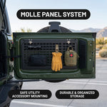 MOLLE panel on the tailgate table shown holding gloves for accessory mounting